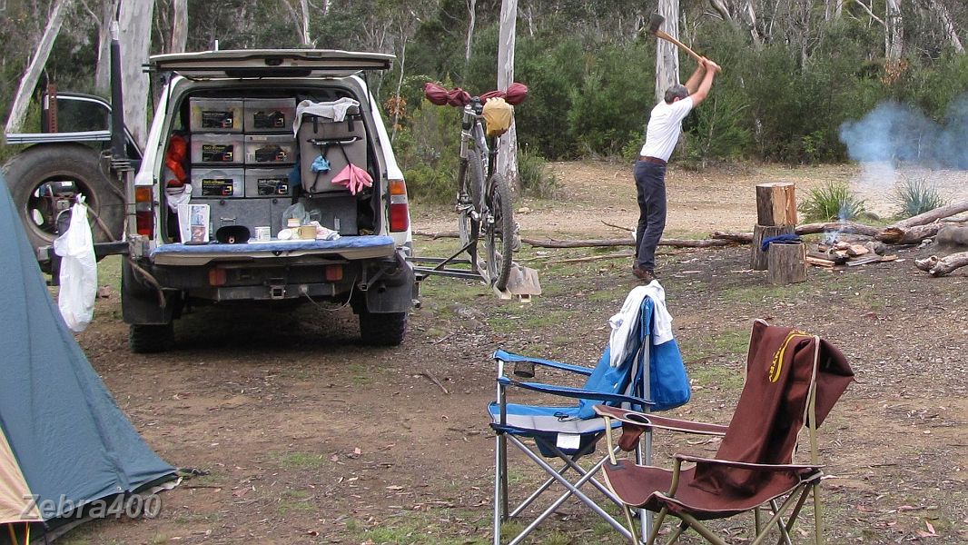 23-Heidi flexes some muscle at our Lake Rowellan campsite.JPG